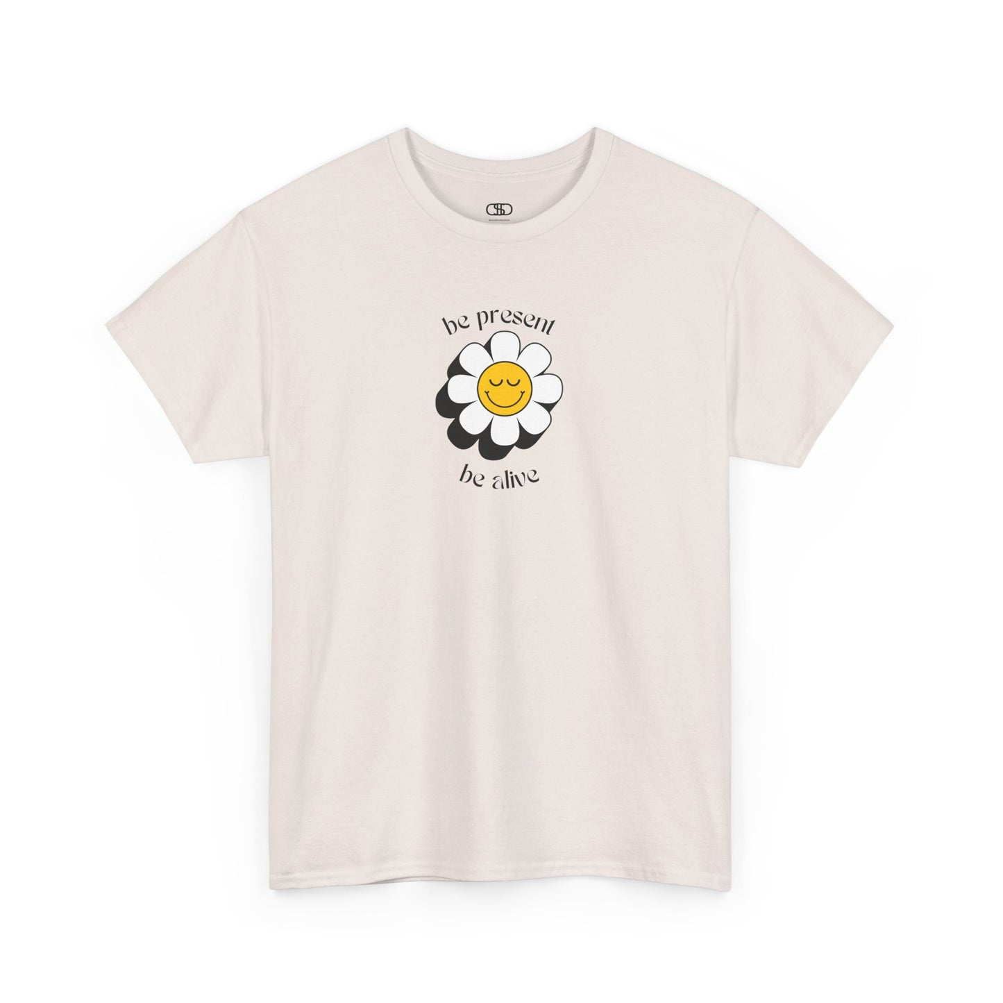 A vibrant yellow sunflower graphic on a t-shirt. The inspirational phrase “Be Present, Be Alive” is elegantly integrated into the design.