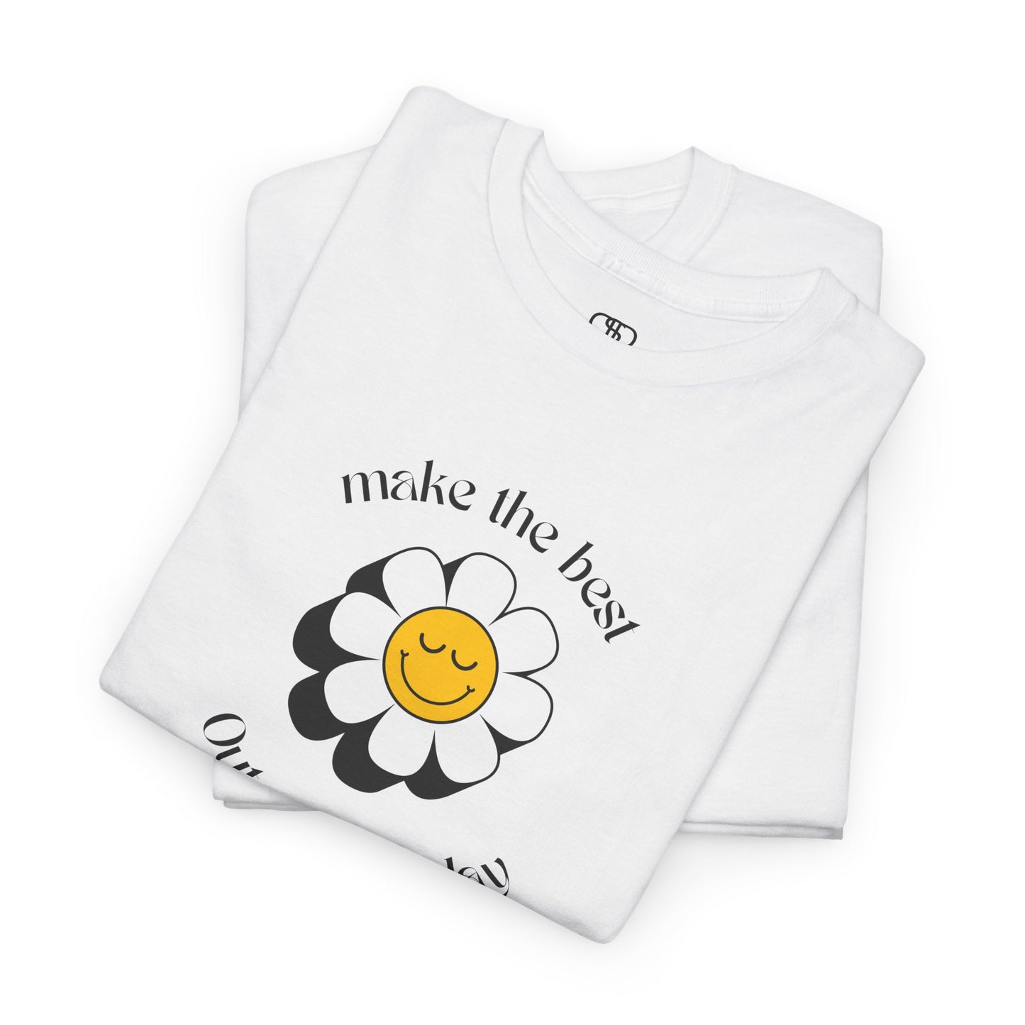 A folded white t-shirt with a smiling sunflower and the words “Make the best out of Everyday” on the front and “Dear Person behind me, I’m glad that you are here” on the back.