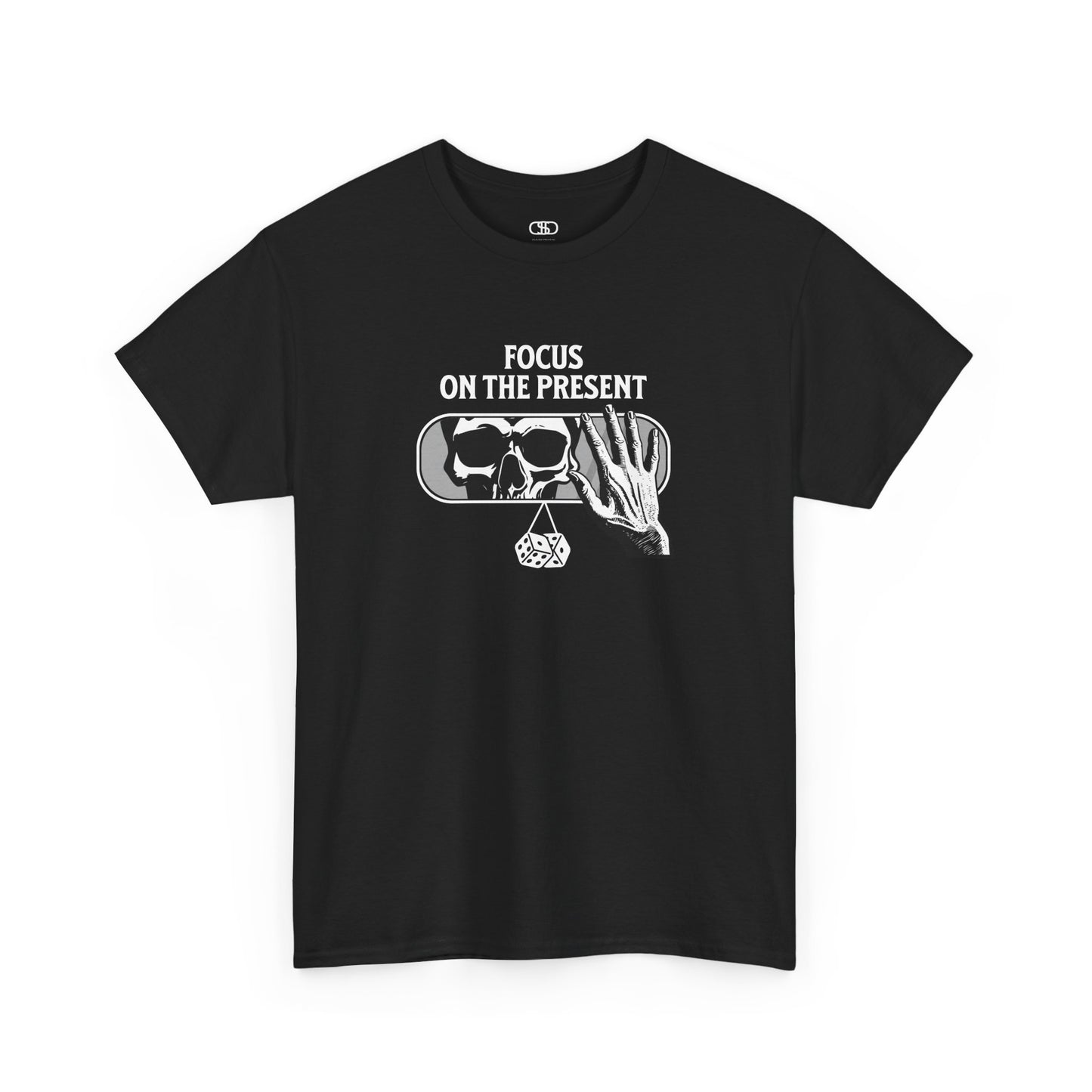 A t-shirt graphic of a car's rearview mirror reflecting a skeleton's face. A living hand reaches toward the mirror, which has dice dangling from it. The phrase “Focus on the present” is part of the design.