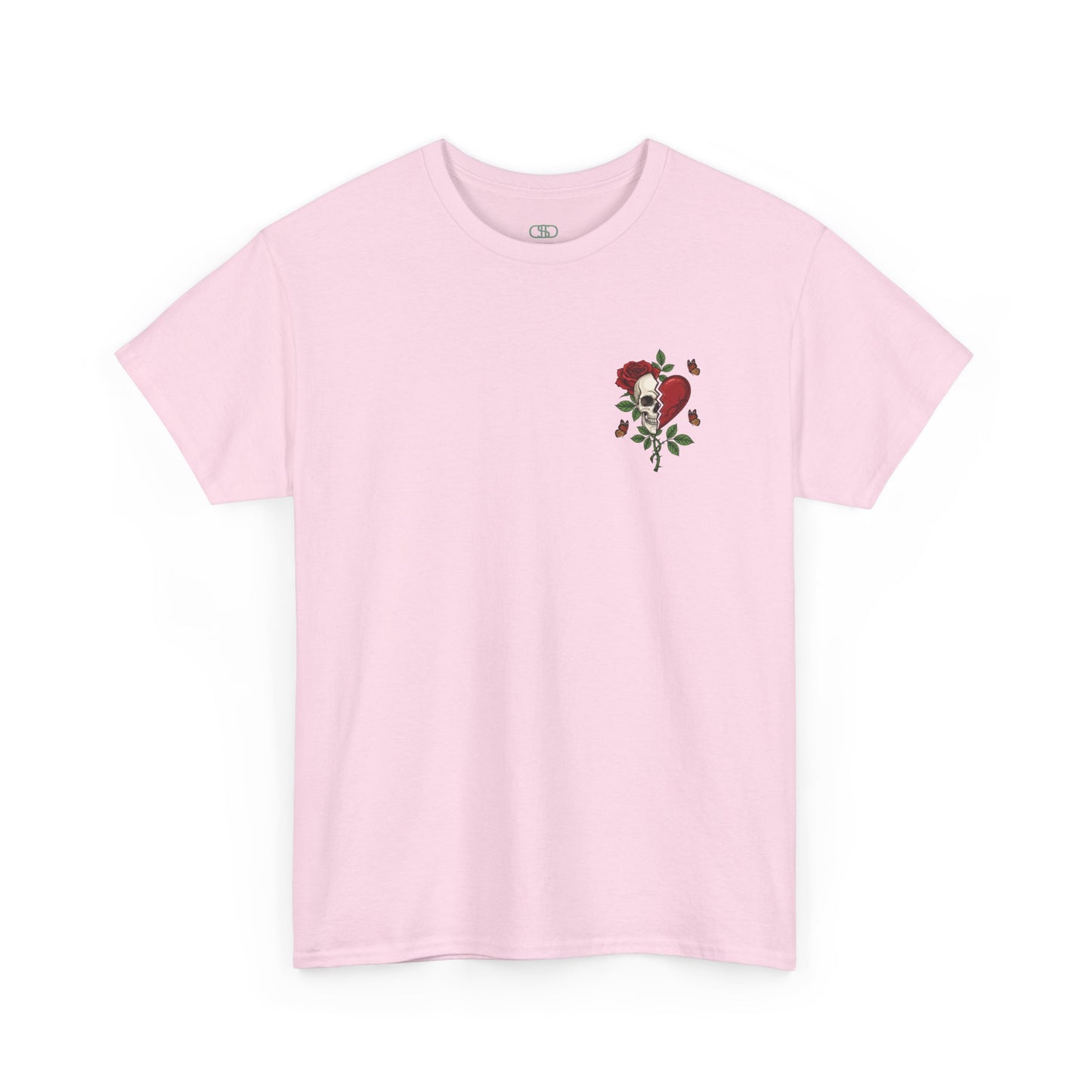 A light pink t-shirt with a front design of a half skull, half broken heart, and a rose. The back reads "Gym Heals" in red.