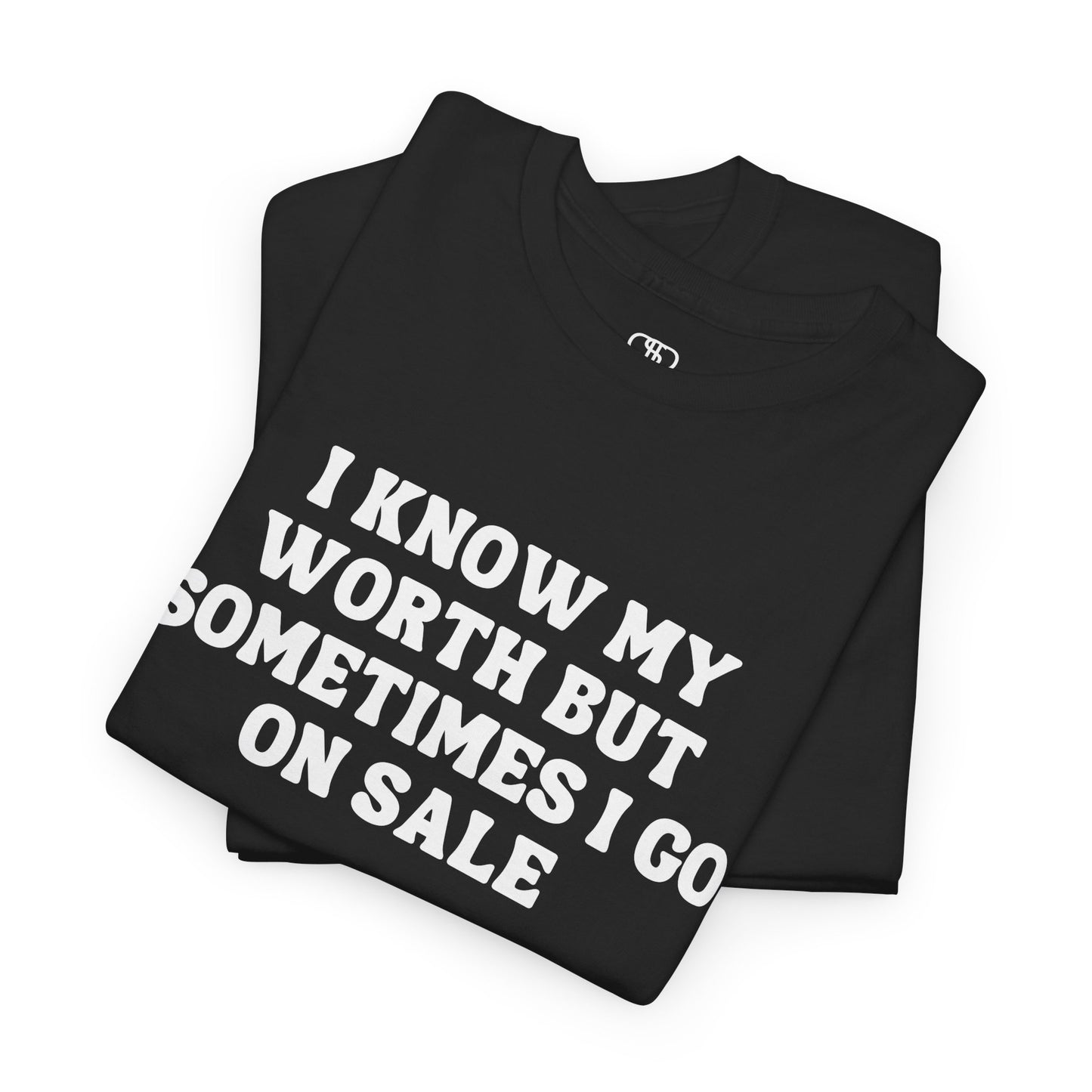 A folded t-shirt featuring the funny and sarcastic quote, “I Know My Worth but sometimes I Go on Sale,” in a stylish, bold font.