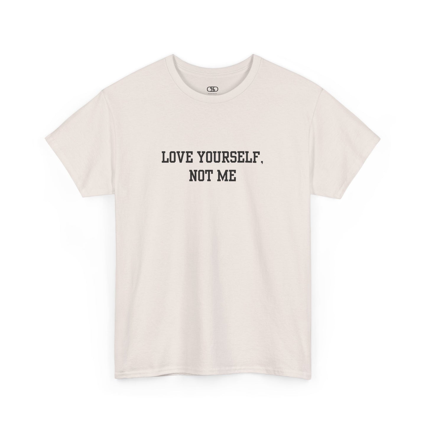 A minimalist t-shirt with the bold, centered text "Love yourself, not me" in a clean, modern font.