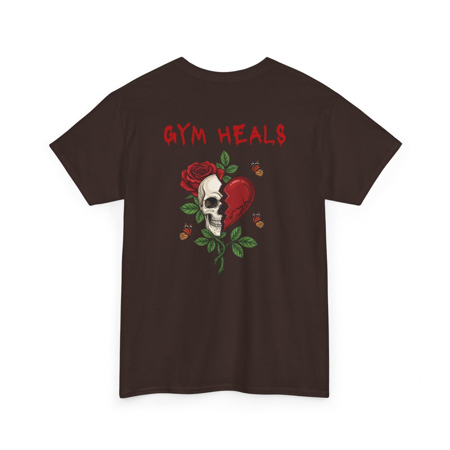 A dark brown t-shirt with a front design of a half skull, half broken heart, and a rose. The back reads "Gym Heals" in red.