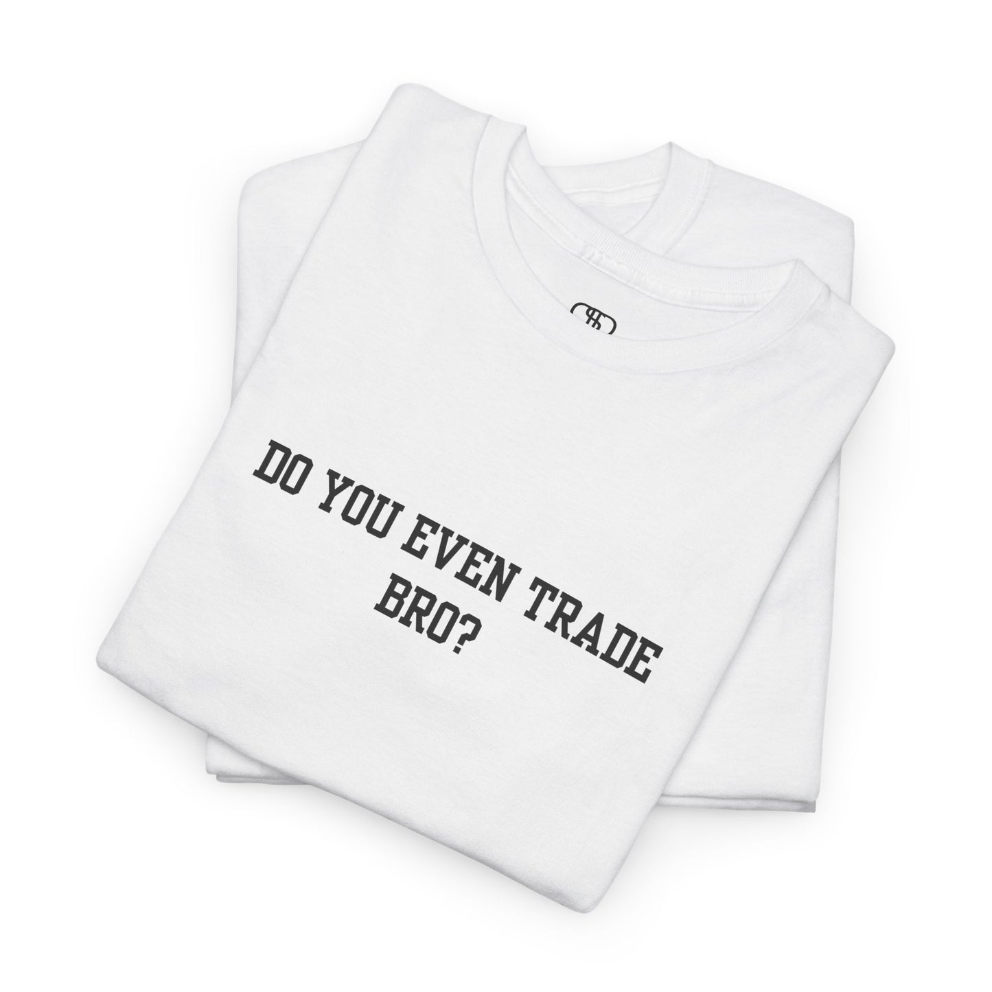 A folded white t-shirt with the text "Do You Even Trade, Bro?" prominently displayed on the front. The shirt is shown in a clean, well-lit setting, highlighting the bold and humorous design.