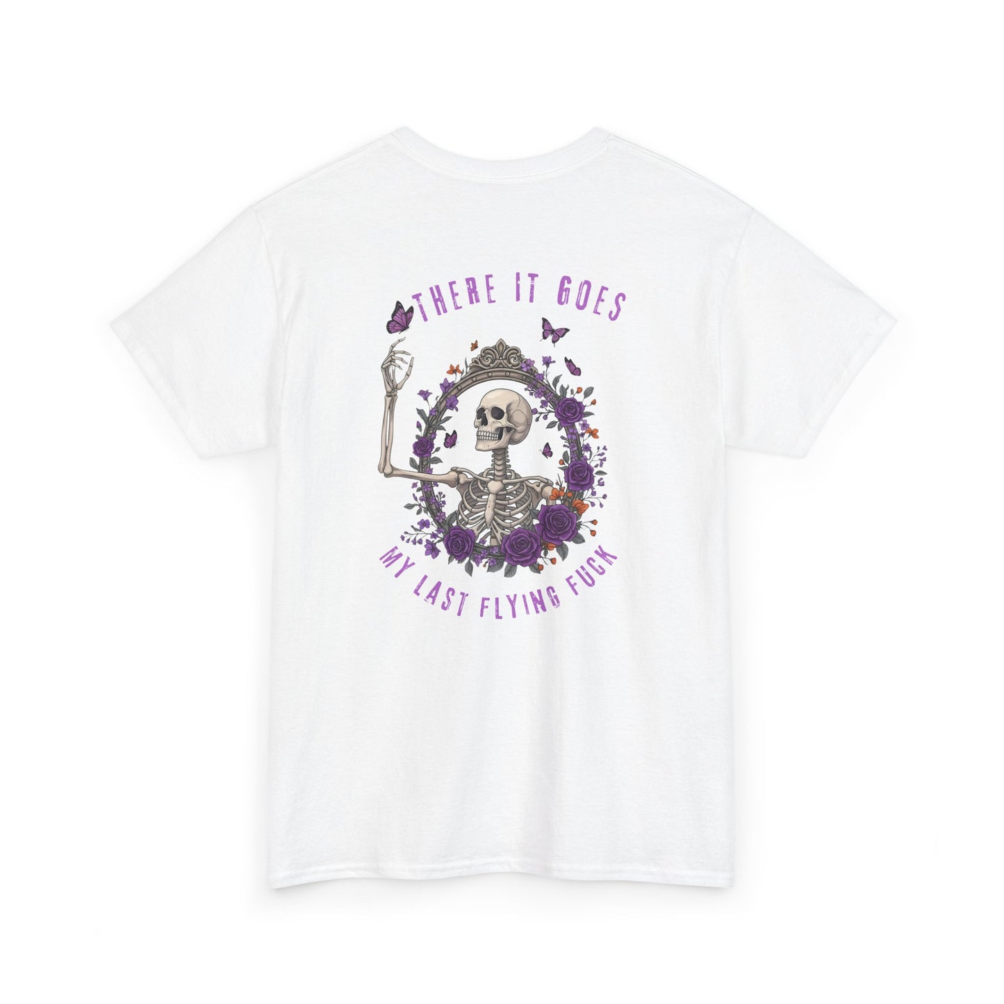 A white t-shirt with a skeleton hand flipping its middle finger on the front surrounded by vines, roses, & butterflies, and a full skeleton design on the back with the phrase “My Last Flying Fuck.”
