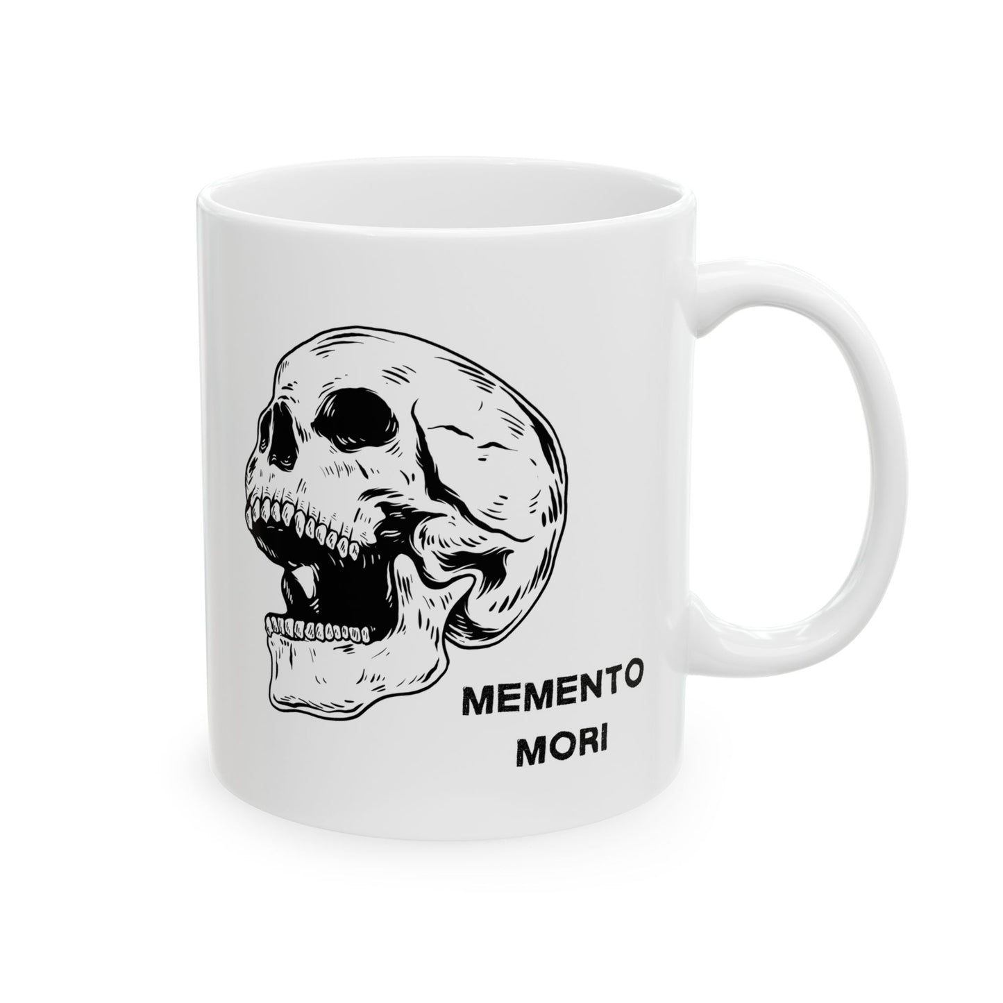 A white ceramic mug with a daring skull design and the words 'Memento Mori' printed on the side.