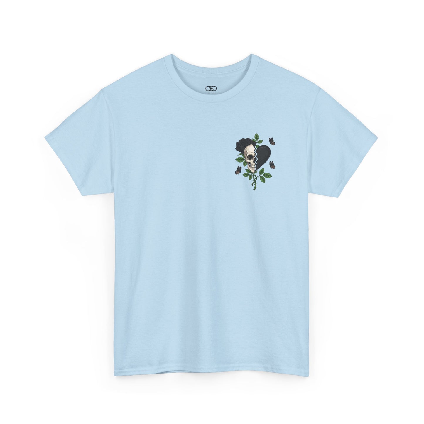 A light blue t-shirt with a front design of a half skull, half broken heart, and a rose. The back reads "Gym Heals" in black.