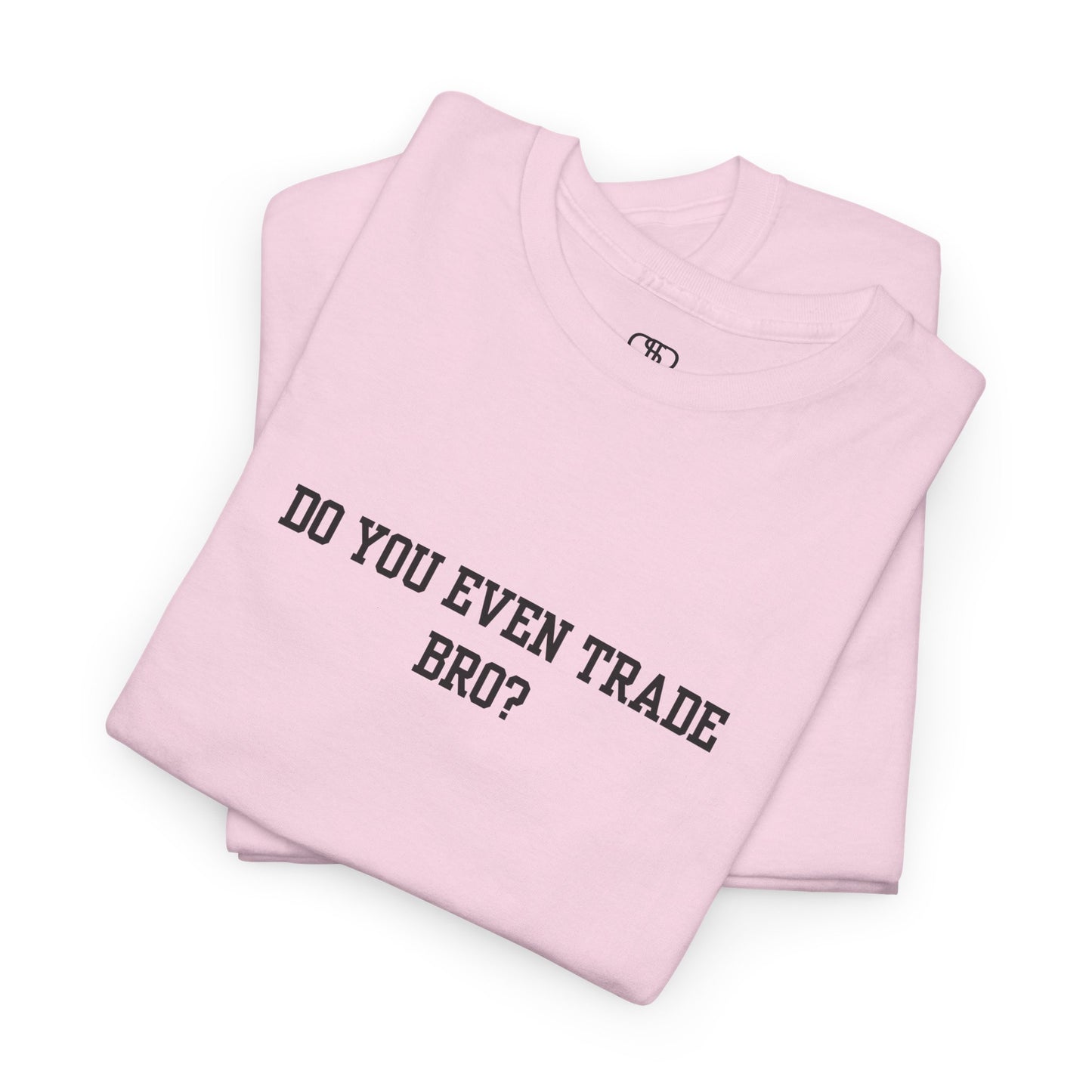 A light pink t-shirt with the text "Do You Even Trade, Bro?" prominently displayed on the front. The shirt is shown in a clean, well-lit setting, highlighting the bold and humorous design.