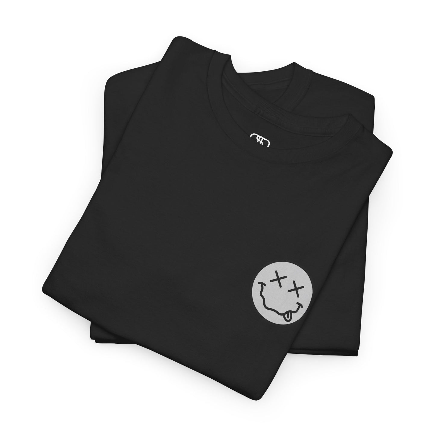 A folded black t-shirt with a smiley face emoji on the front and the phrase “Everything Hurts and I am Hungry” in a retro font on the back.
