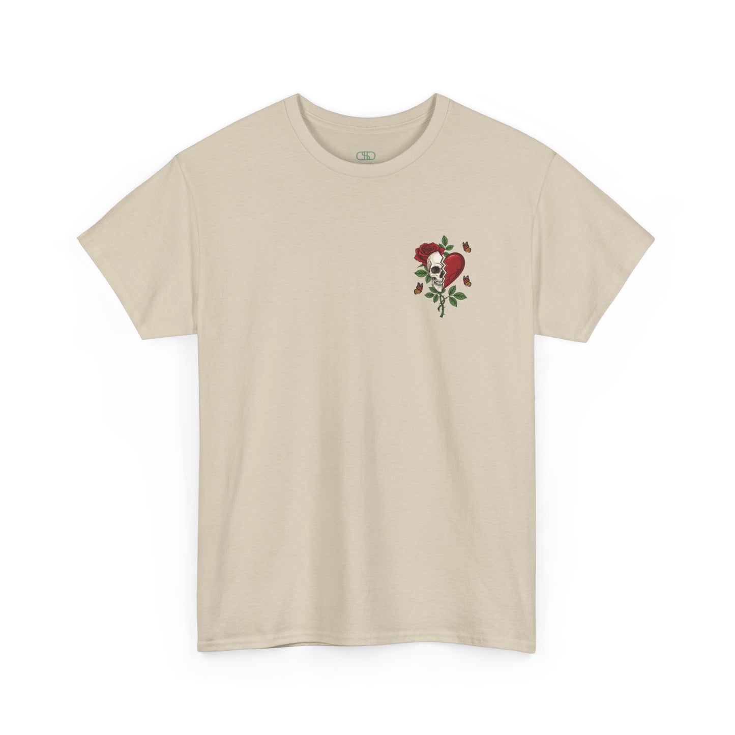 A beige t-shirt with a front design of a half skull, half broken heart, and a rose. The back reads "Gym Heals" in red.
