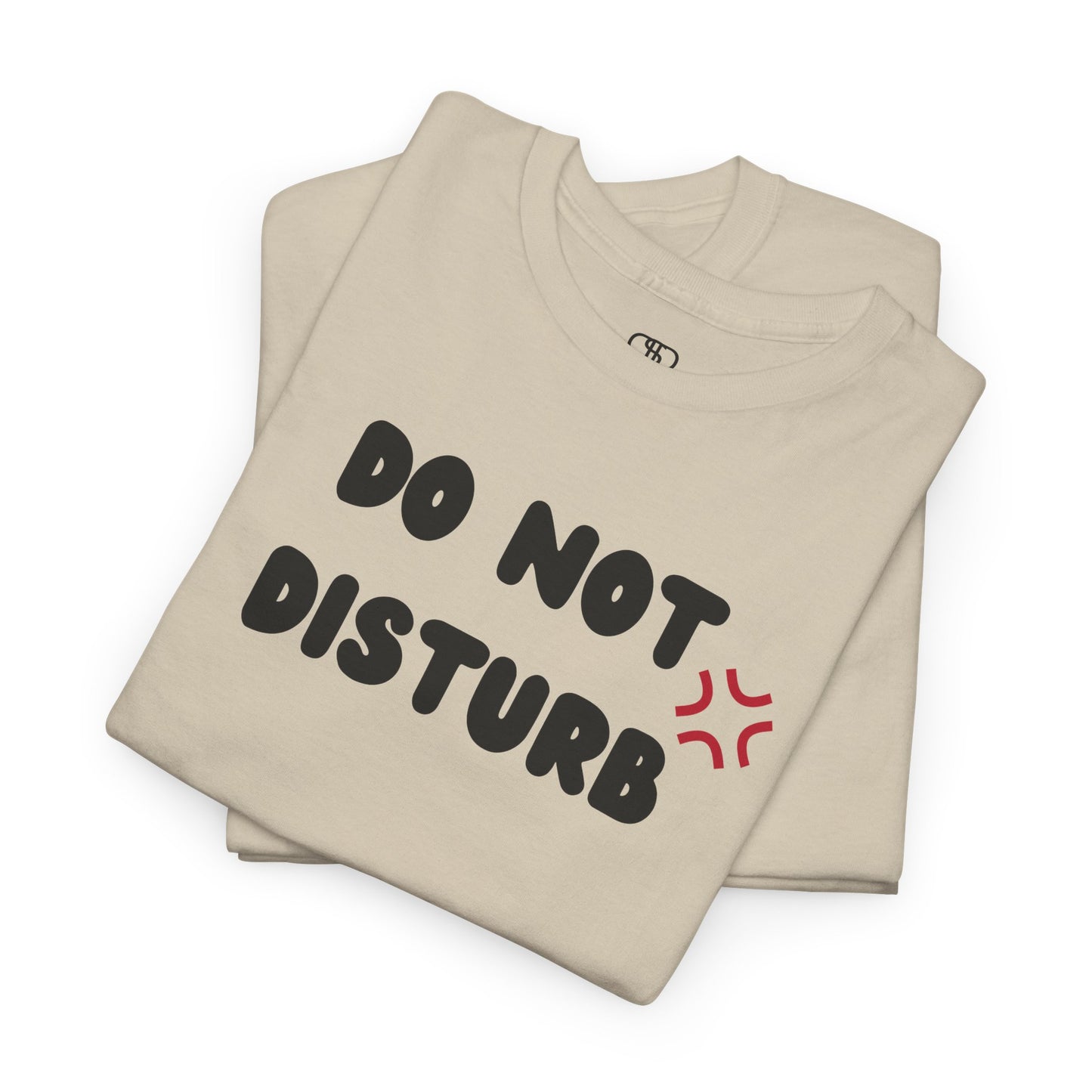 A t-shirt with the words "Do Not Disturb" printed above a stylized angry asterisk symbol, like those used in cartoons and anime to show irritation.