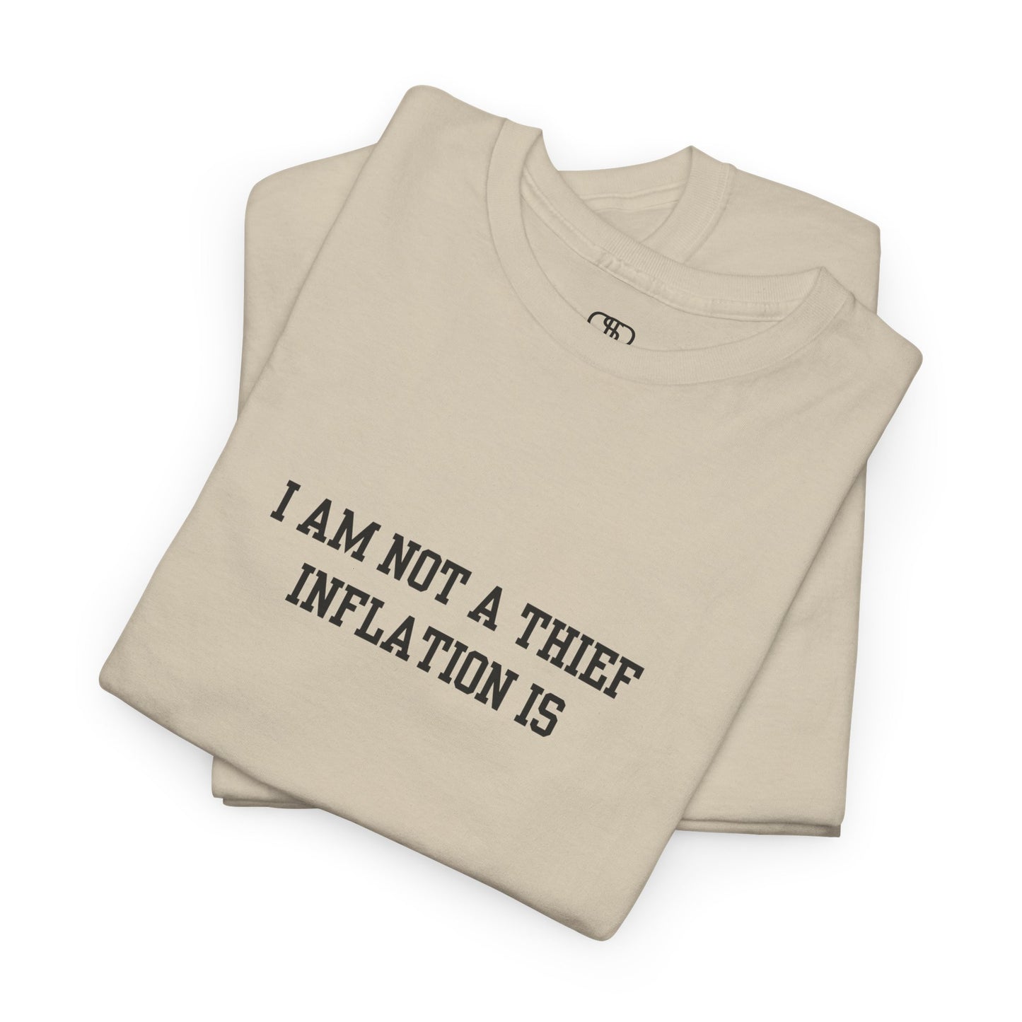 A sand t-shirt with the phrase “I am not a thief Inflation is” on the front.