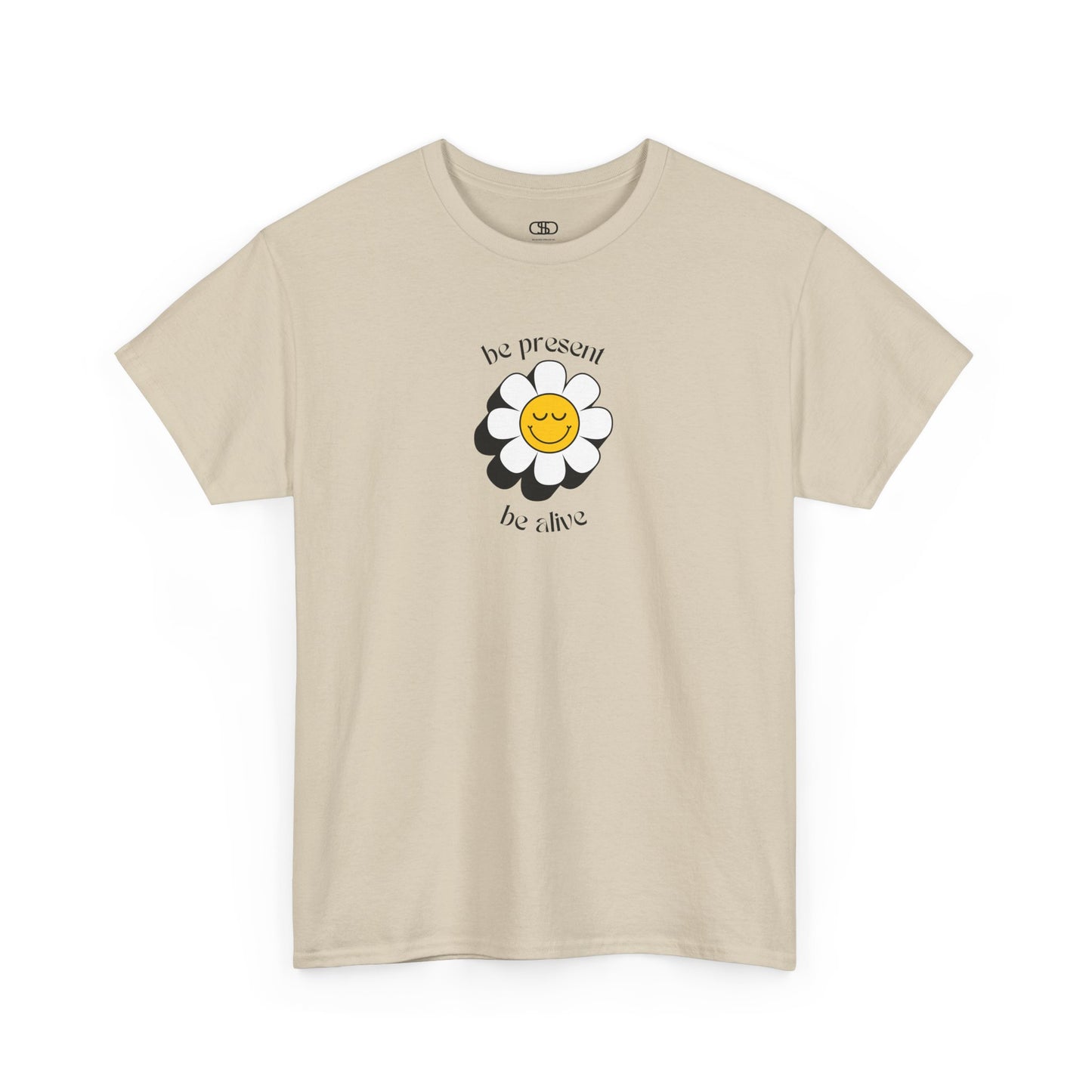 A vibrant yellow sunflower graphic on a t-shirt. The inspirational phrase “Be Present, Be Alive” is elegantly integrated into the design.