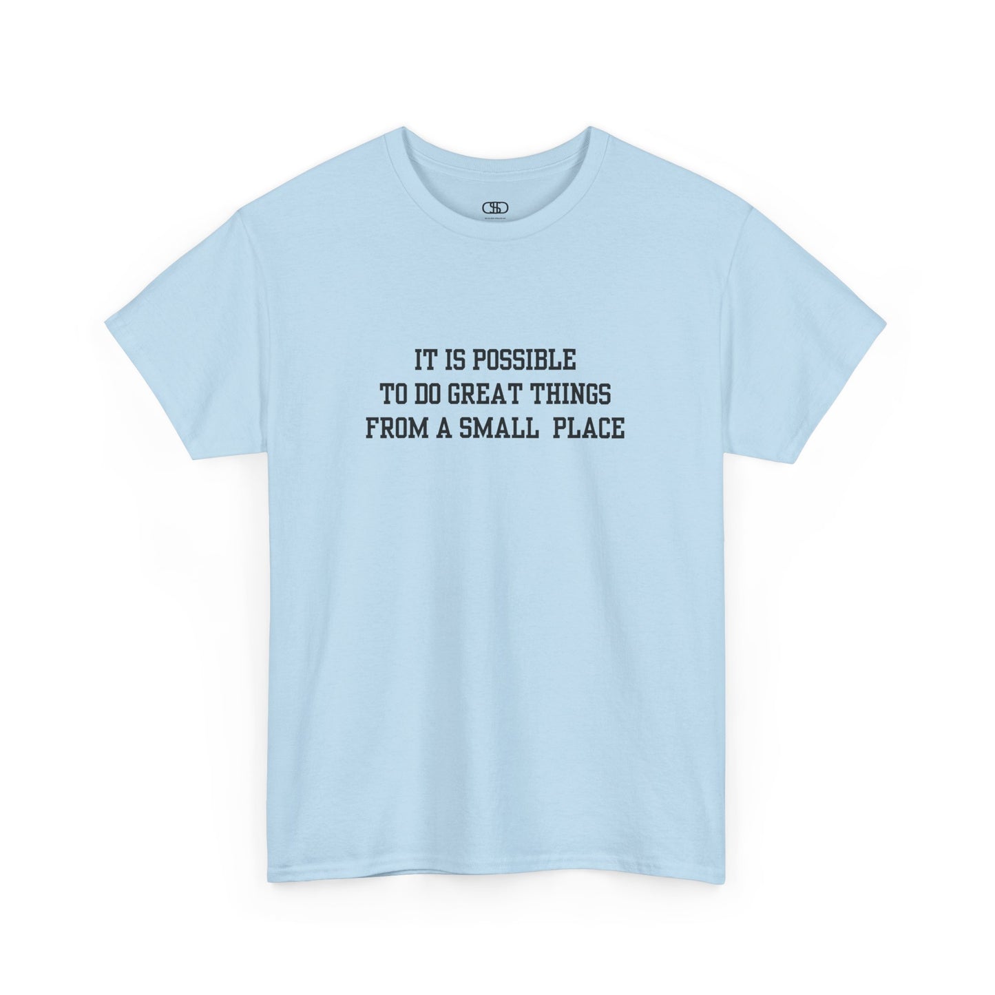 A light blue t-shirt with the quote “It is possible to do great things from a small place” on the front.