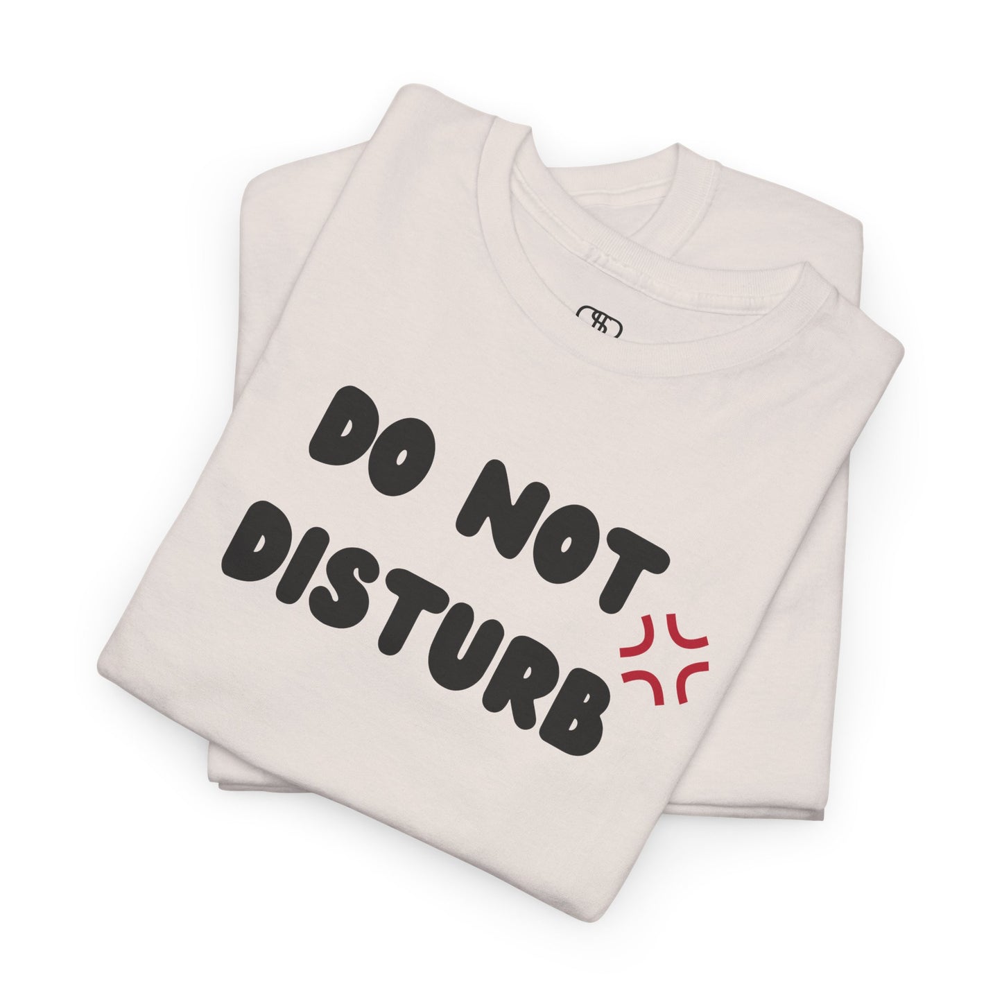 A t-shirt with the words "Do Not Disturb" printed above a stylized angry asterisk symbol, like those used in cartoons and anime to show irritation.