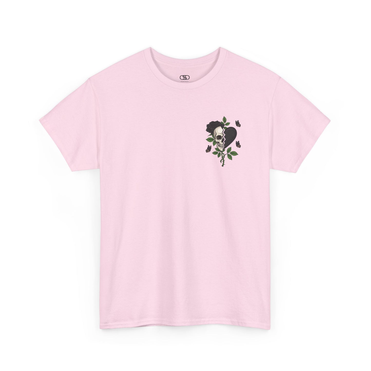 A light pink t-shirt with a front design of a half skull, half broken heart, and a rose. The back reads "Gym Heals" in black.