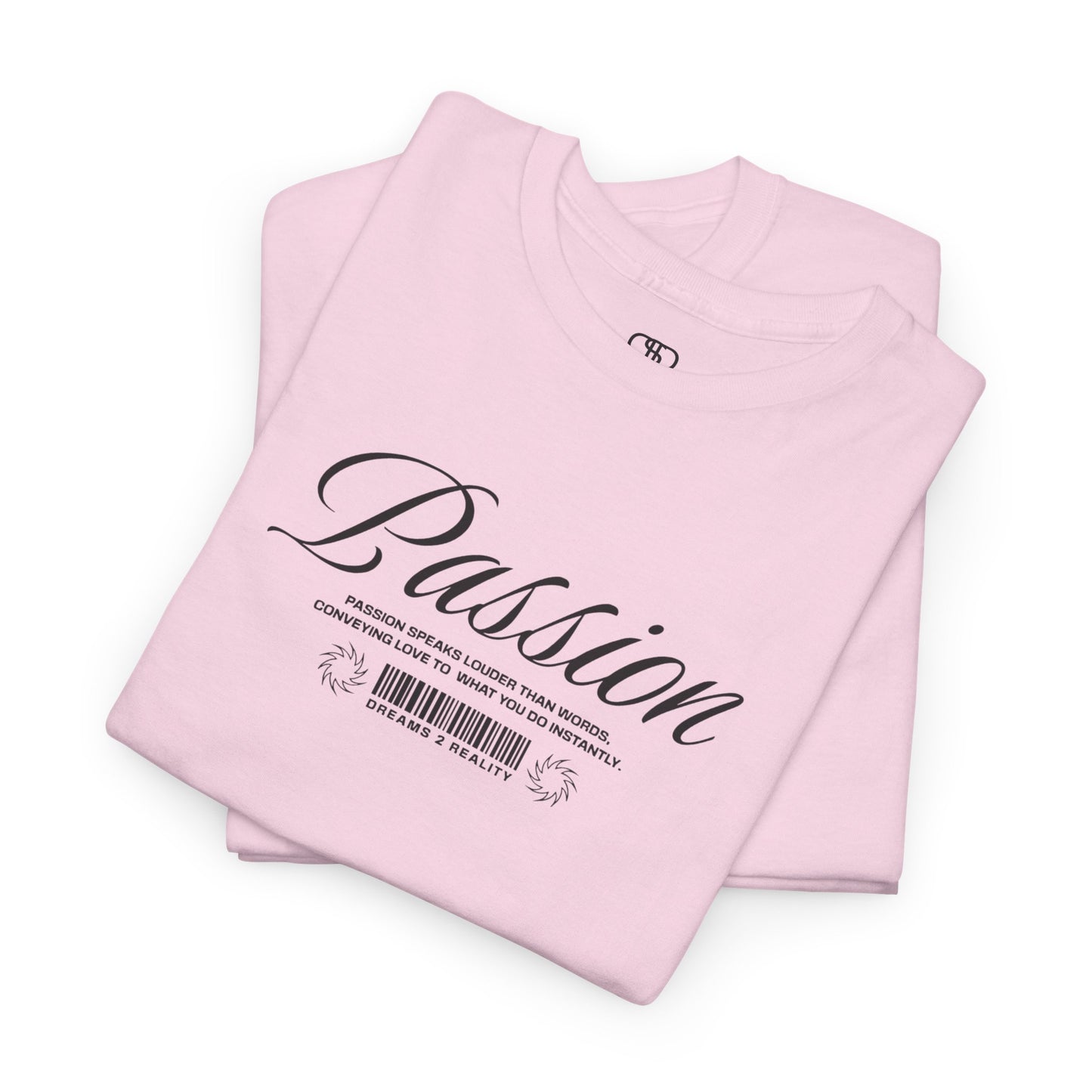 A folded light pink t-shirt where the front makes a bold, immediate statement with the word "Passion" in an elegant, unmissable cursive font. Beneath it, a unique barcode design symbolizes your personal journey from "Dreams 2 Reality," reminding you that your goals are scannable, trackable, and achievable.