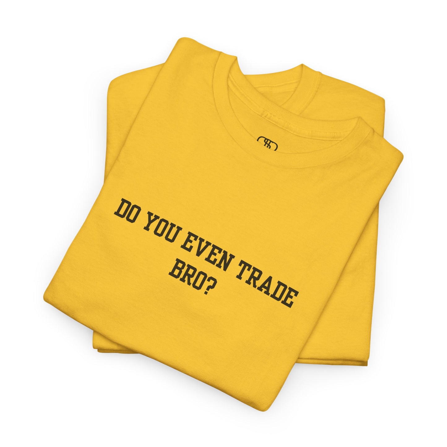 A folded daisy t-shirt with the text "Do You Even Trade, Bro?" prominently displayed on the front. The shirt is shown in a clean, well-lit setting, highlighting the bold and humorous design.