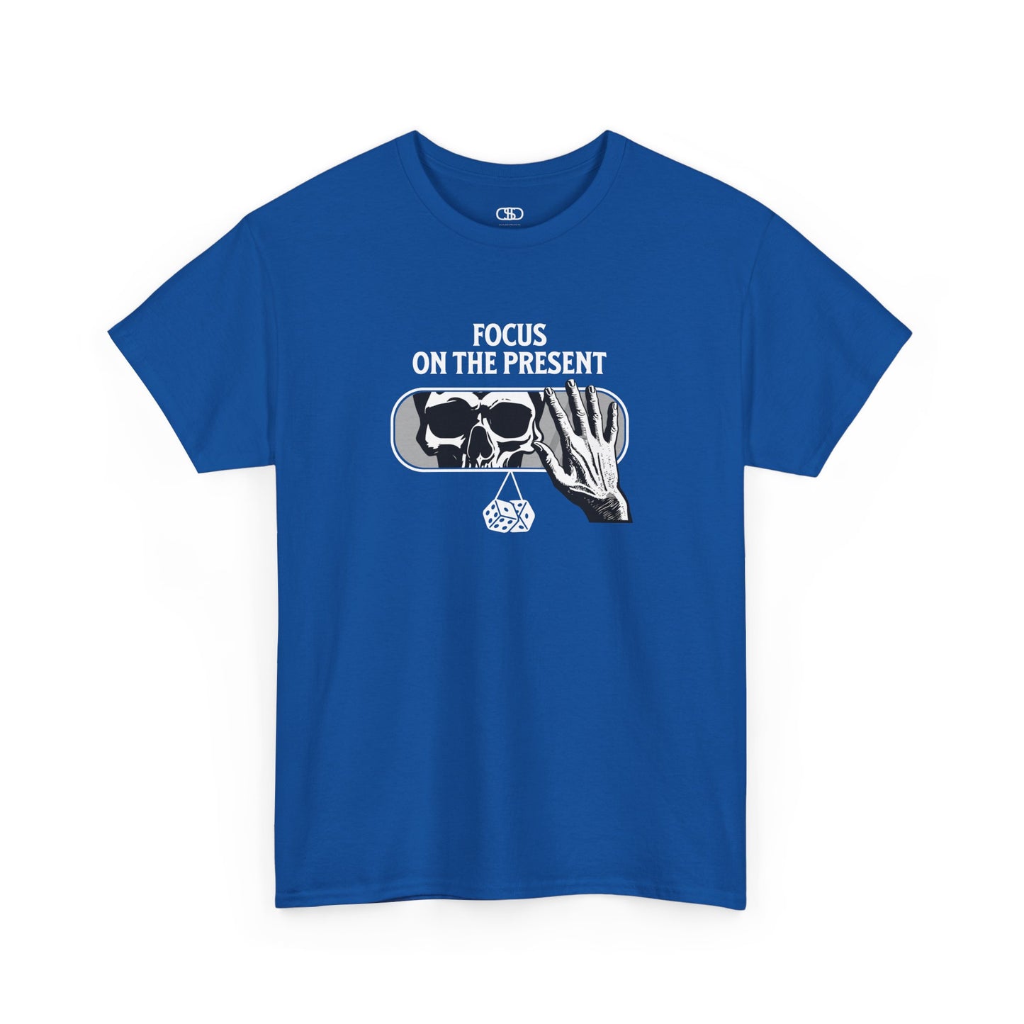 A t-shirt graphic of a car's rearview mirror reflecting a skeleton's face. A living hand reaches toward the mirror, which has dice dangling from it. The phrase “Focus on the present” is part of the design.