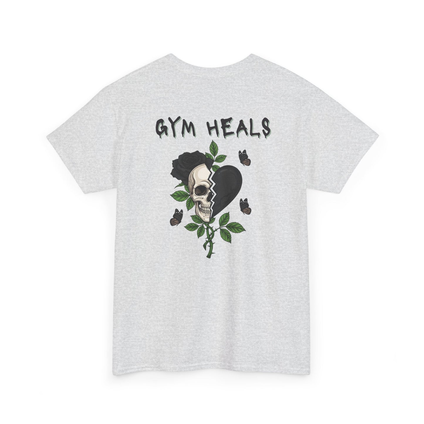 An ash gray t-shirt with a front design of a half skull, half broken heart, and a rose. The back reads "Gym Heals" in black.