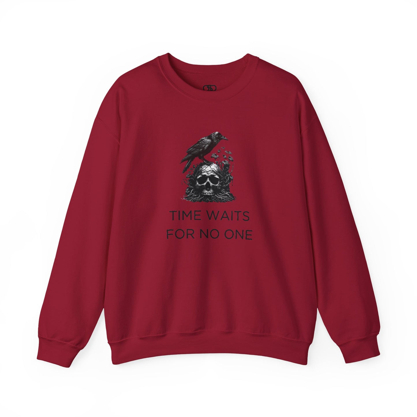 A sweatshirt featuring a detailed illustration of a crow perched on a human skull that is intertwined with overgrown vines and moss. Along with the words Time Waits For No One.