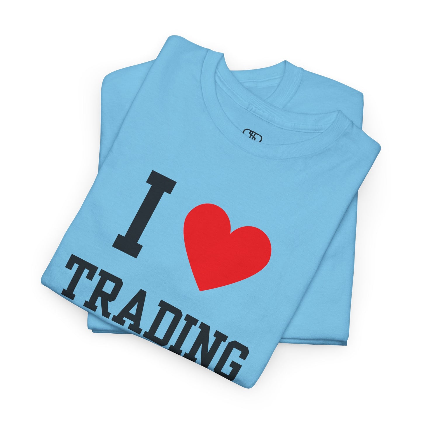 A minimalist sky blue t-shirt featuring the "I Love design with the text "I," a red heart symbol, and the word "Trading" underneath.
