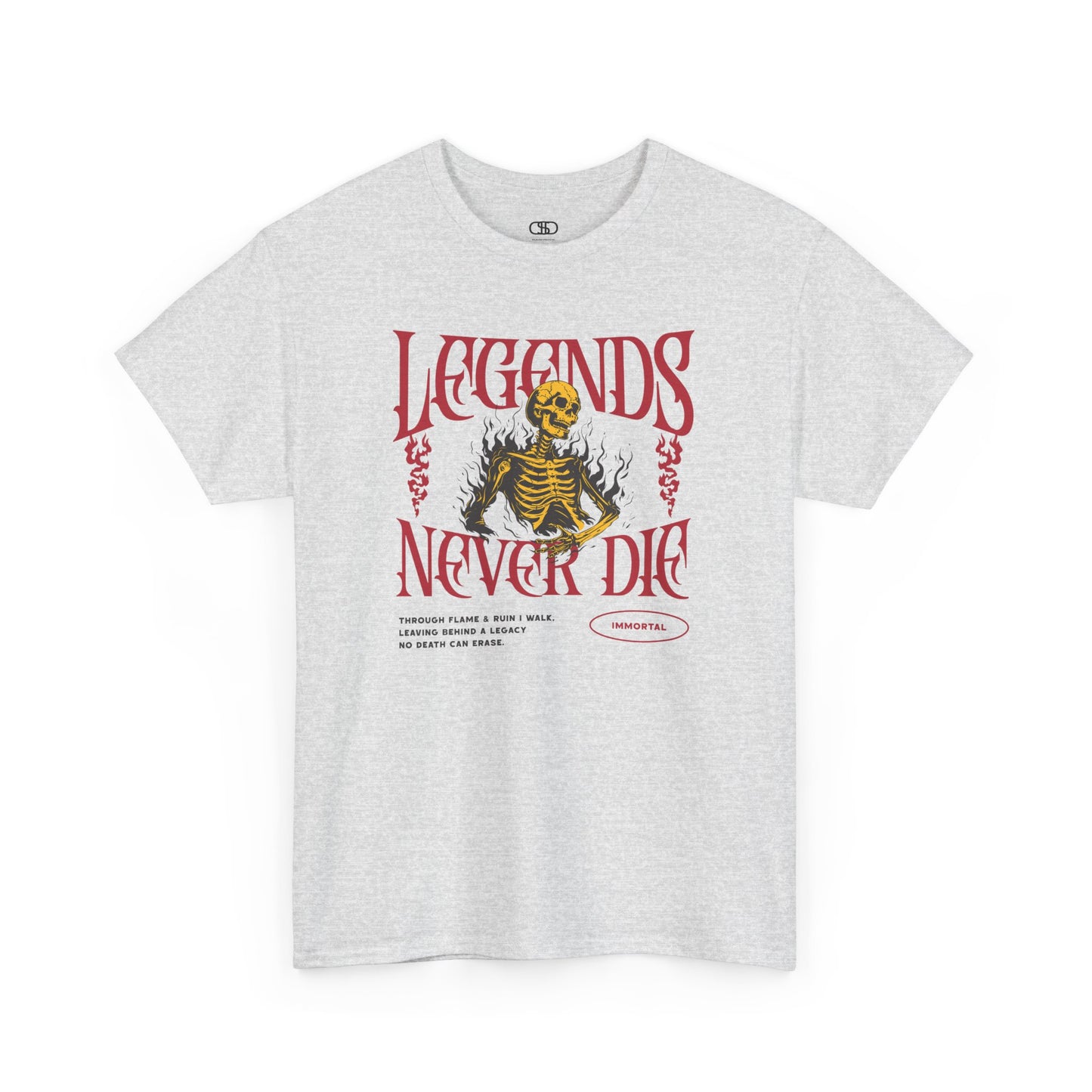 An ash gray t-shirt with a graphic of a defiant skeleton engulfed in flames. The words “Legends Never Die” are prominently displayed, with a smaller quote and the word “Immortal” included in the design.