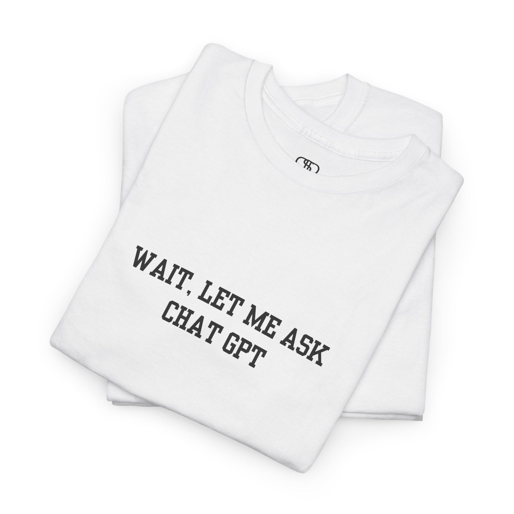 A [folded white] t-shirt with the phrase “Wait, Let me ask Chat Gpt.” on the front.