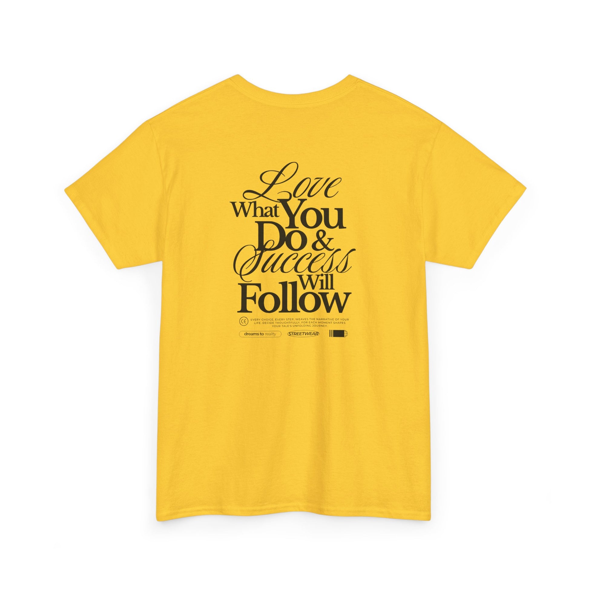 A daisy t-shirt featuring a masterclass in motivation. The back features two powerful messages:
A bold declaration: "Love What You Do & Success Will Follow."
A profound reminder: "Every Choice, every Step, weaves the narrative of your life, decide thoughtfully, for each moment shapes your tale's unfolding Journey."