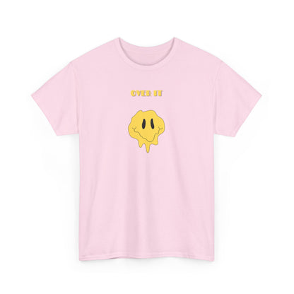 A t-shirt with a graphic of a yellow smiley face emoji melting into a puddle, with the words "Over It" printed below in a bold font.