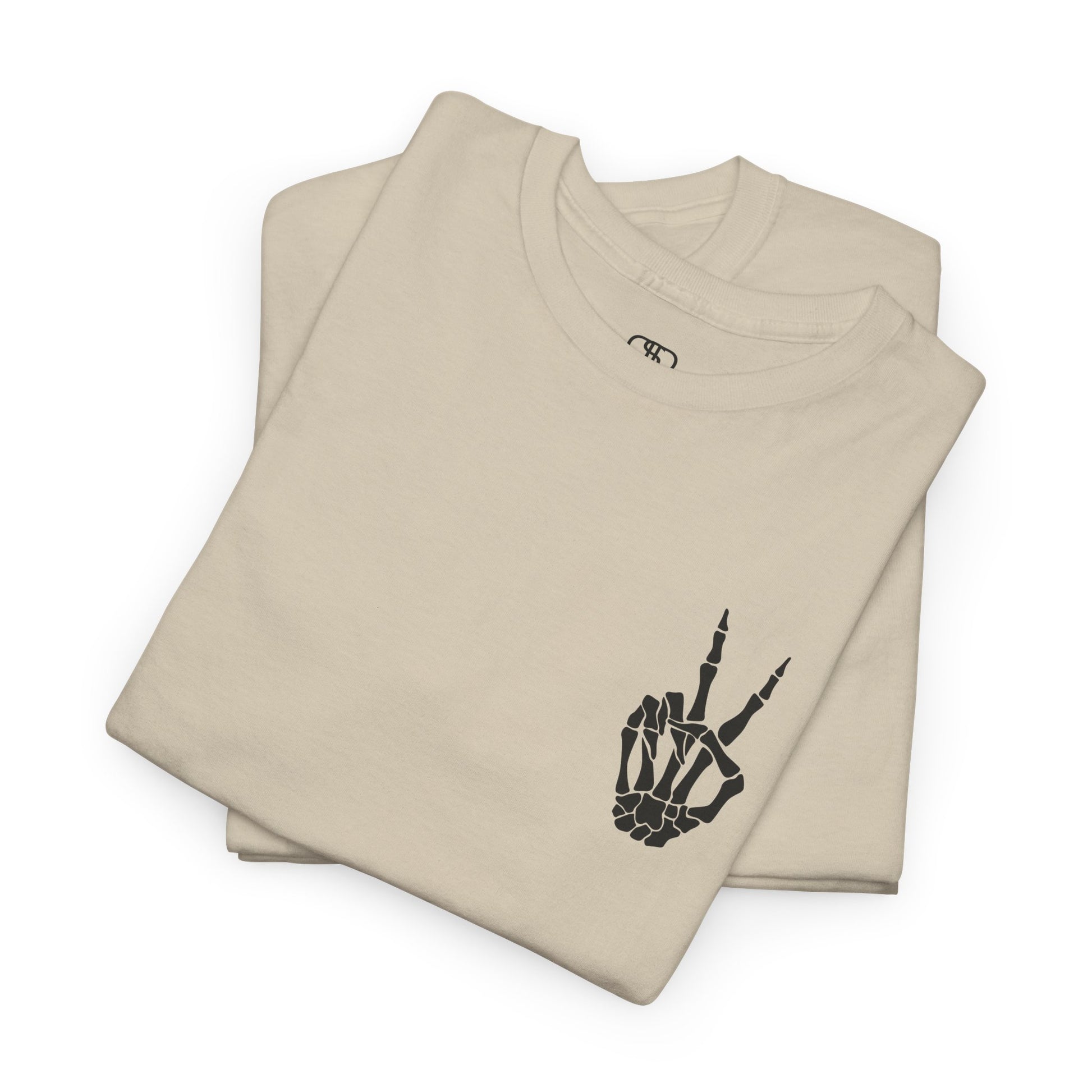A [folded sand] t-shirt with a skeletal peace sign on the front and the phrase “Have the day you deserve” with a large skeletal peace sign on the back.