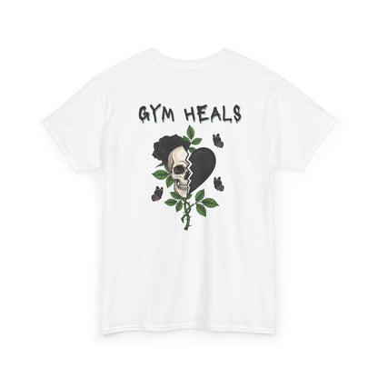 A white t-shirt with a front design of a half skull, half broken heart, and a rose. The back reads "Gym Heals" in black.