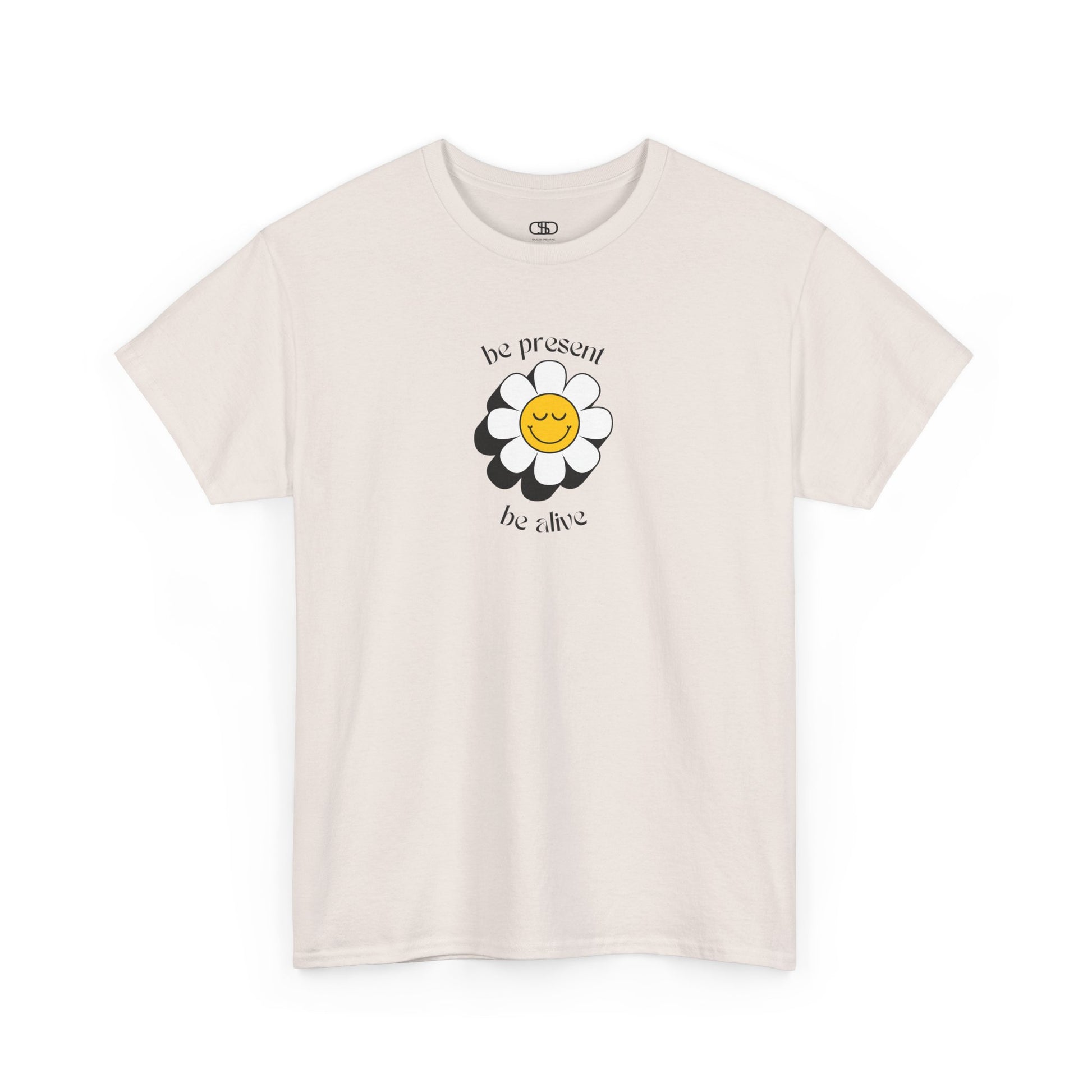 A vibrant yellow sunflower graphic on a t-shirt. The inspirational phrase “Be Present, Be Alive” is elegantly integrated into the design.