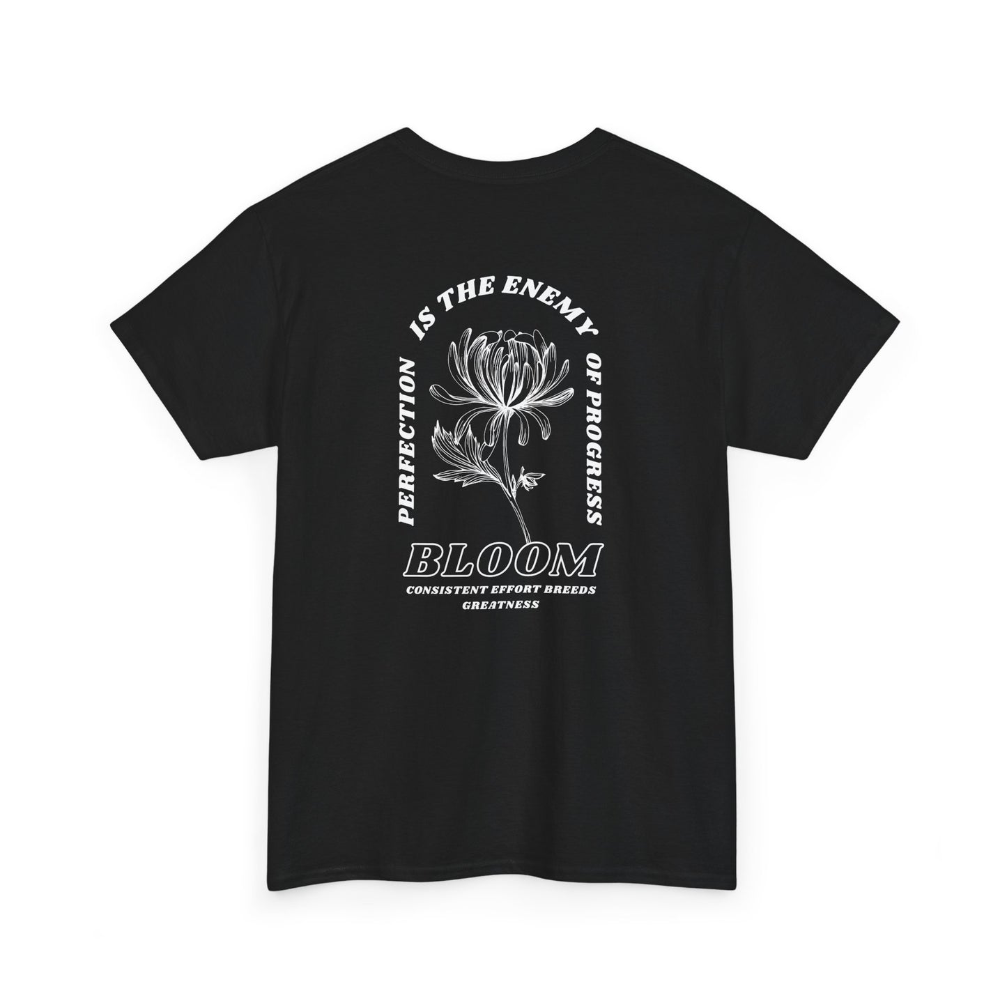 A [black] t-shirt with a central flower design and the words “Perfection is the enemy of progress” and “Bloom” underneath it the phrase "Consistent effort breeds greatness," featured on the back of the t-shirt.