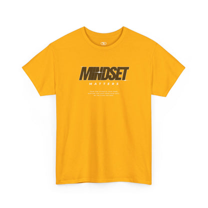 A Gold T-shirt featuring text stating "Mindset Matters" text with stars on a t-shirt, inspirational quote below.