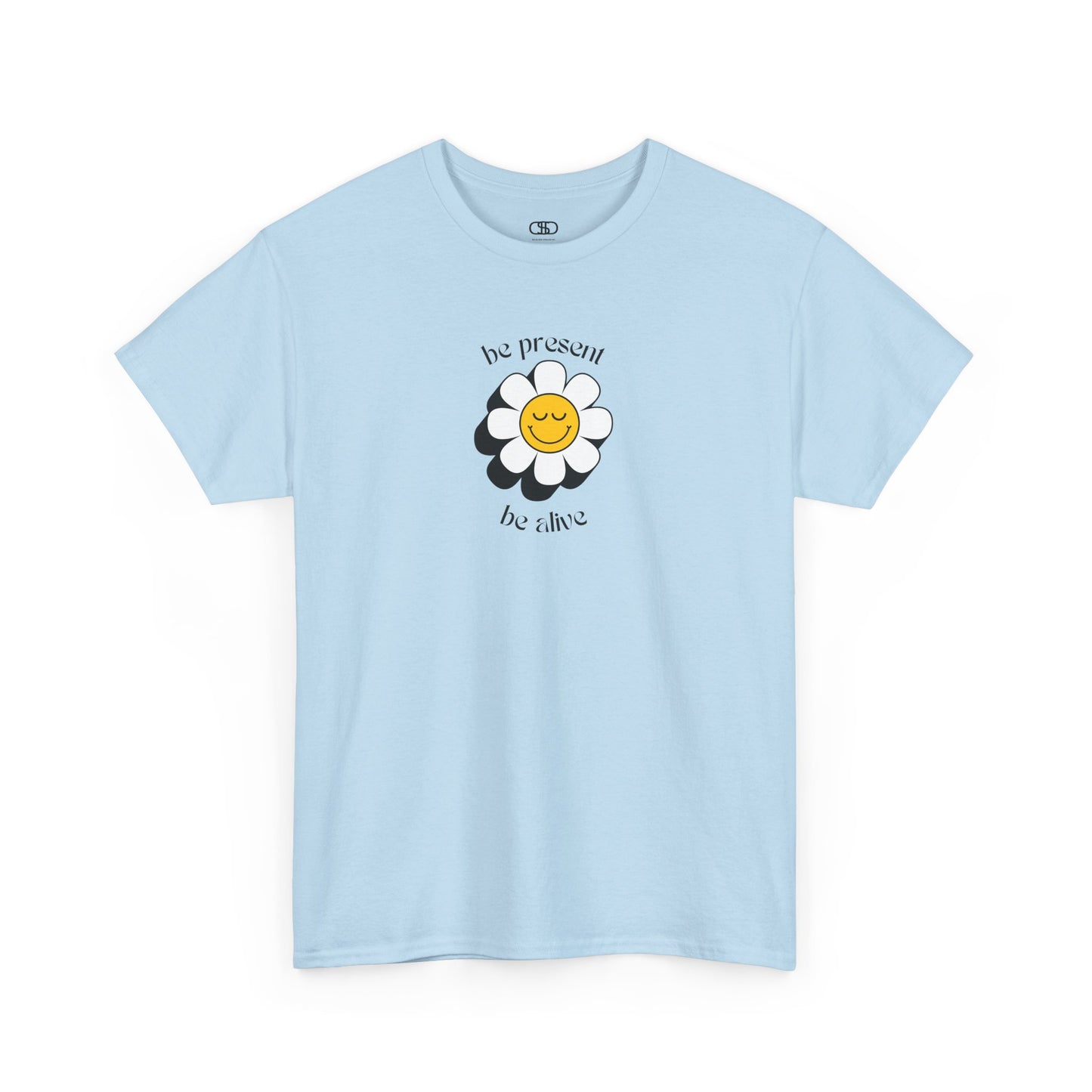 A vibrant yellow sunflower graphic on a t-shirt. The inspirational phrase “Be Present, Be Alive” is elegantly integrated into the design.