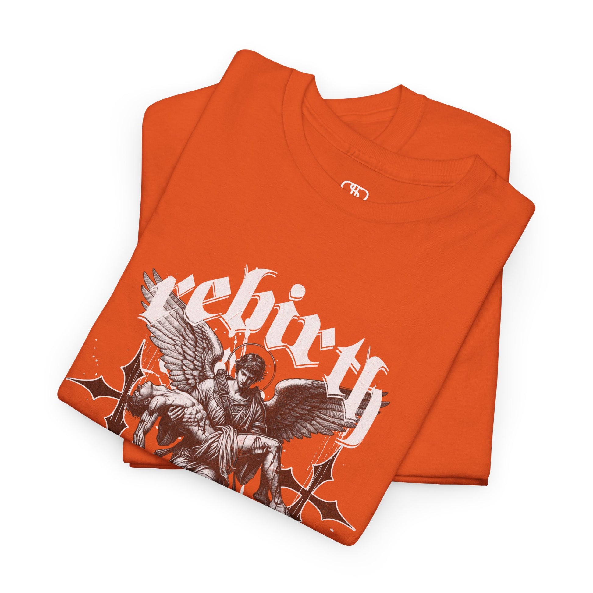 A folded orange T-shirt featuring a Angel carrying a figure with "Rebirth" text, white and black gothic spiritual art t-shirt.