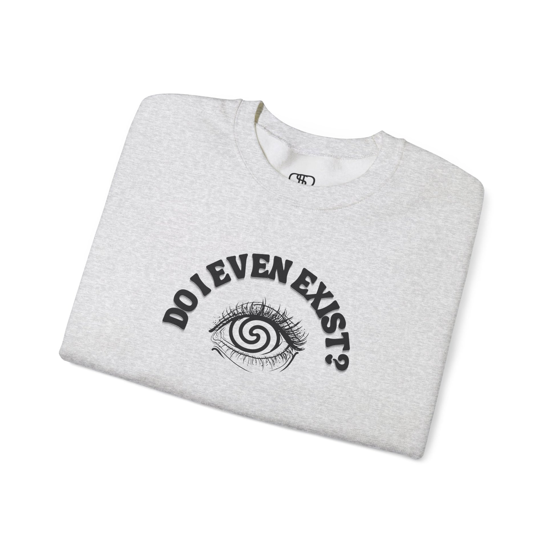 A folded Ash Gray sweatshirt with a graphic print of a detailed, realistic eye that contains an optical illusion of a spiral. The text "Do I even Exist?" is printed above the eye in a clean font.