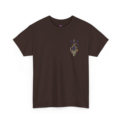 A dark brown t-shirt with a skeleton hand flipping its middle finger on the front surrounded by vines, roses, & butterflies, and a full skeleton design on the back with the phrase “My Last Flying Fuck.”