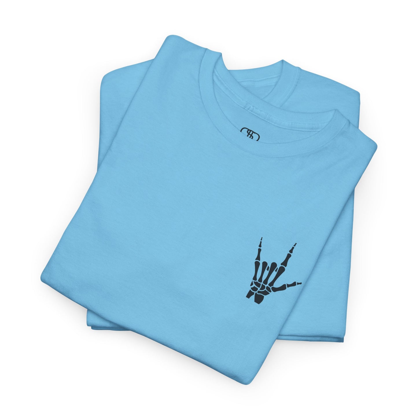 A folded sky blue t-shirt with small rock hand symbol on front, and "Rules.. Never Heard of Them" graffiti text on the back.