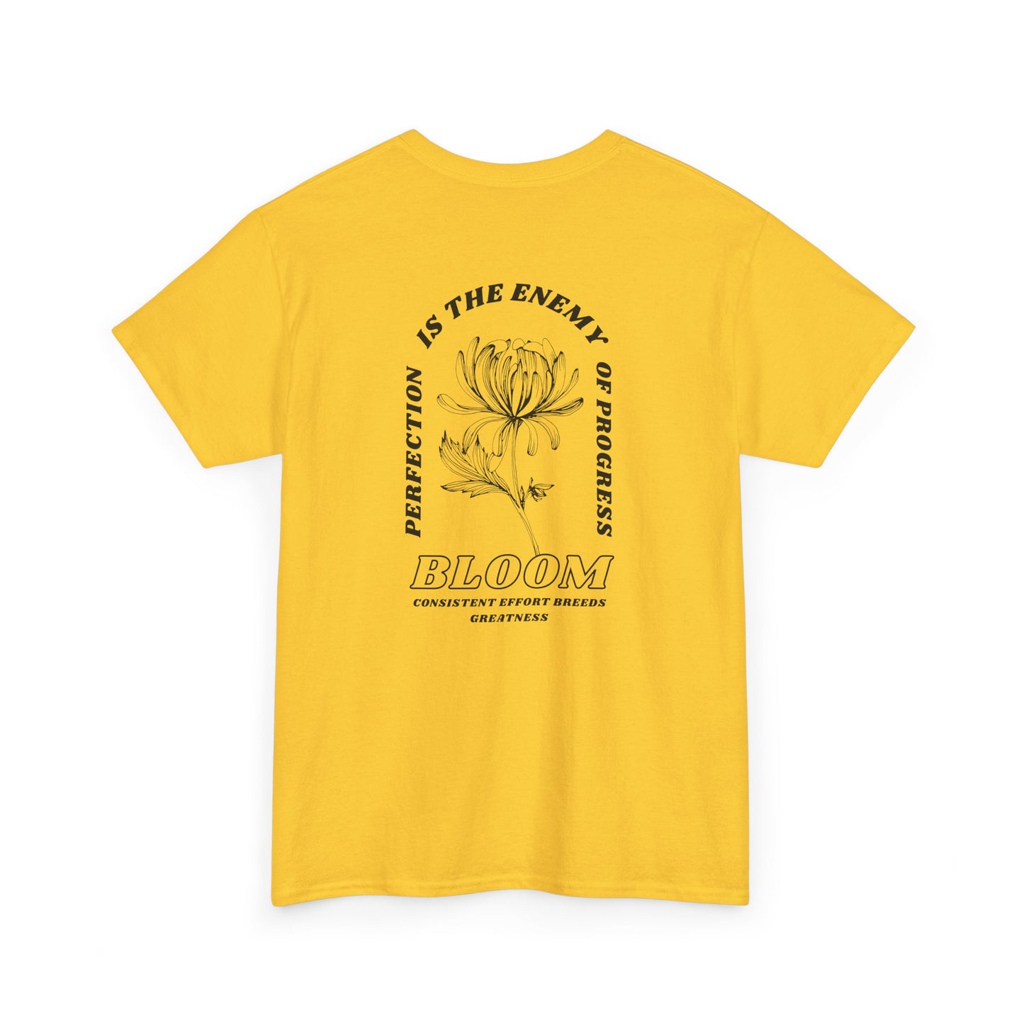 A [daisy] t-shirt with a central flower design and the words “Perfection is the enemy of progress” and “Bloom” underneath it the phrase "Consistent effort breeds greatness," featured on the back of the t-shirt.