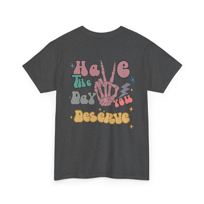 A [heather gray] t-shirt with a skeletal peace sign on the front and the phrase “Have the day you deserve” with a large skeletal peace sign on the back.