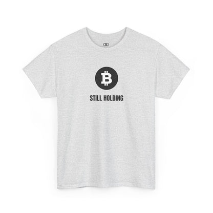 An Ash gray T-shirt with a Bitcoin emblem and "Still Holding" text in black.