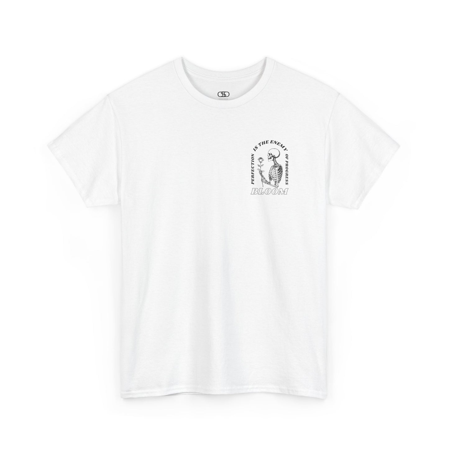 A [white] t-shirt with a central skeleton and rose design and the words “Perfection is the enemy of progress” and “Bloom” on the front.