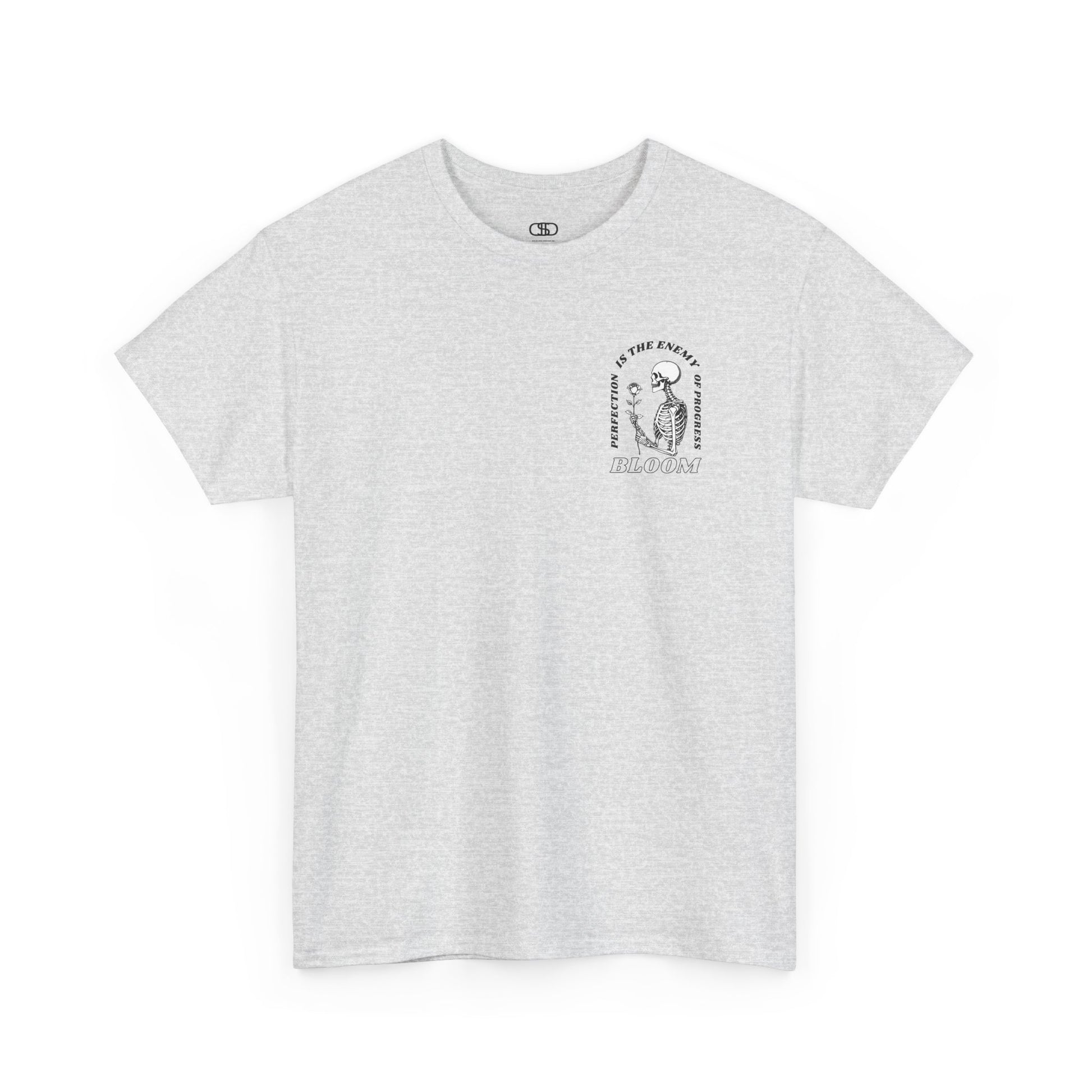An [Ash gray] t-shirt with a central skeleton and rose design and the words “Perfection is the enemy of progress” and “Bloom” on the front.