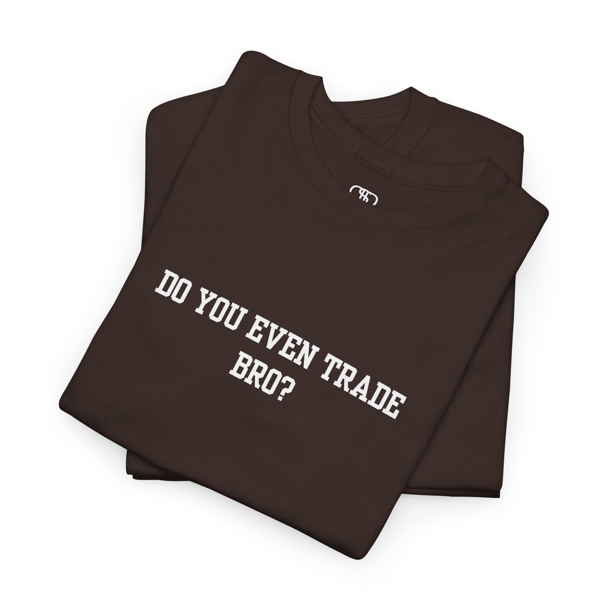 A dark brown folded t-shirt with the text "Do You Even Trade, Bro?" prominently displayed on the front. The shirt is shown in a clean, well-lit setting, highlighting the bold and humorous design.
