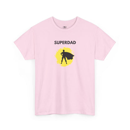 A light pink T-shirt with a "Superdad" text and a silhouette of a person with a cape on a yellow circle background.