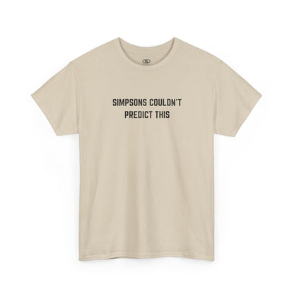Beige t-shirt with black text 'SIMPSONS COULDN'T PREDICT THIS' on a white background