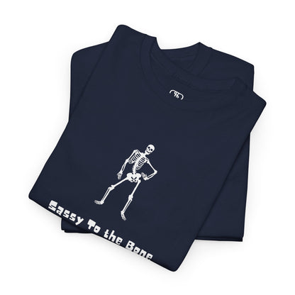 Folded Navy T-shirt with a sassy skeleton graphic with hands on hips and "Sassy to the Bone" text in a cartoon font.