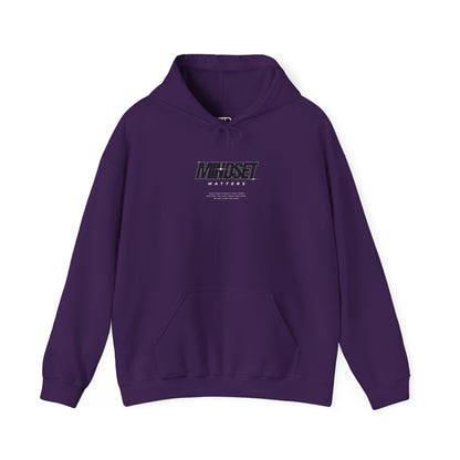 A purple hoodie "Mindset Matters" text with stars on hoodie, with an inspirational quote below.
